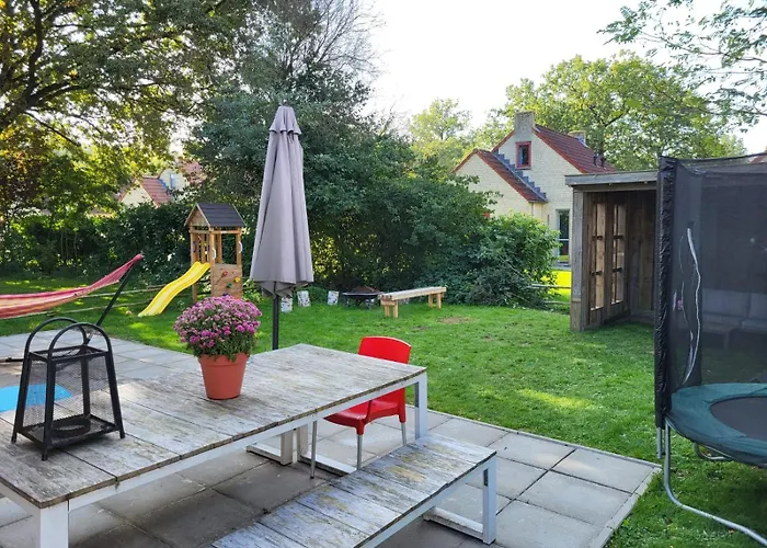 7 Person House With Garden, Firepit, Swimming Lake, Hammock, Child Friendly, In- And Outside Playground, Slide, And Great Coffee